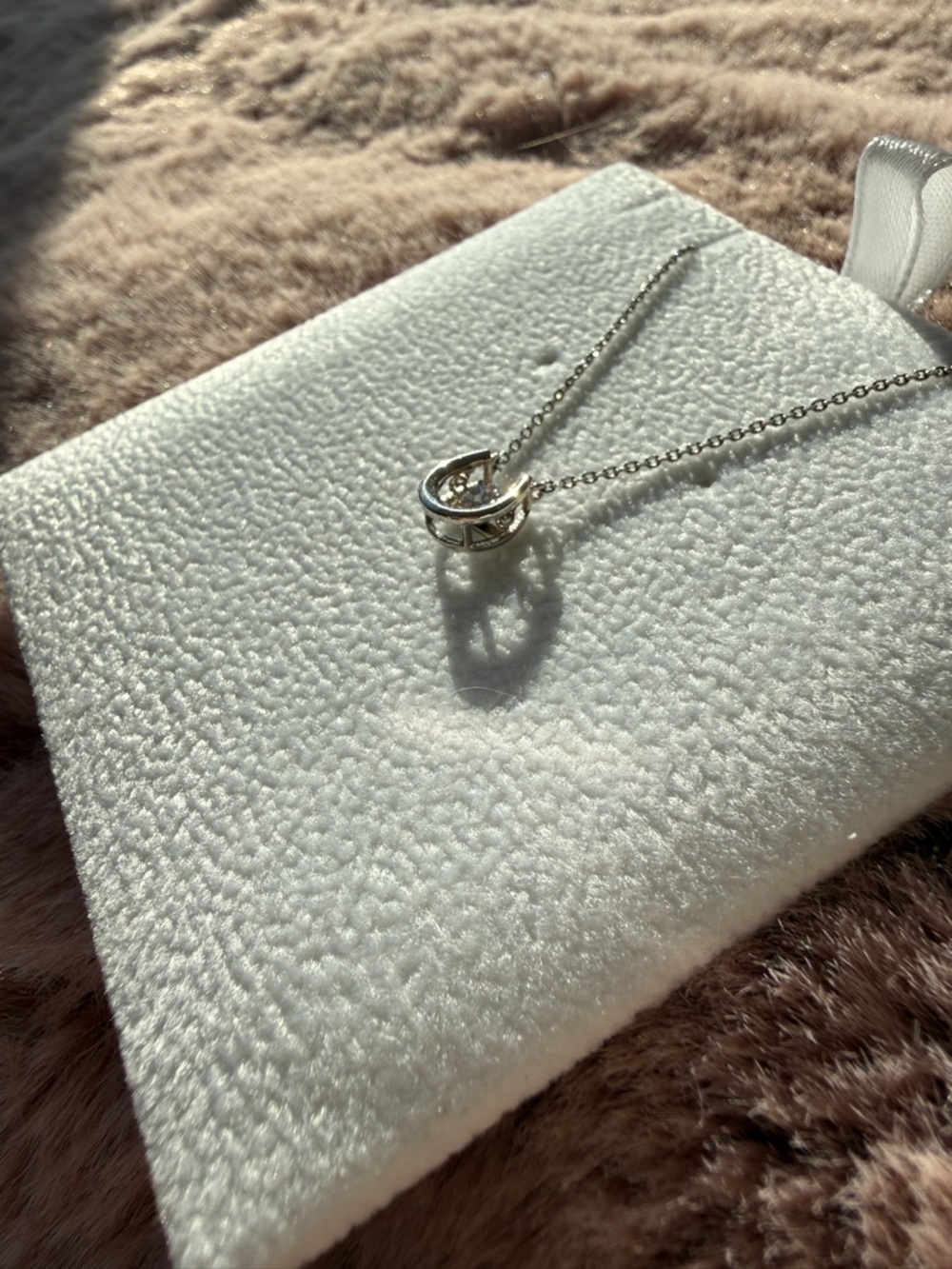 Sterling Silver Horseshoe Necklace with “Dancing Crystal”